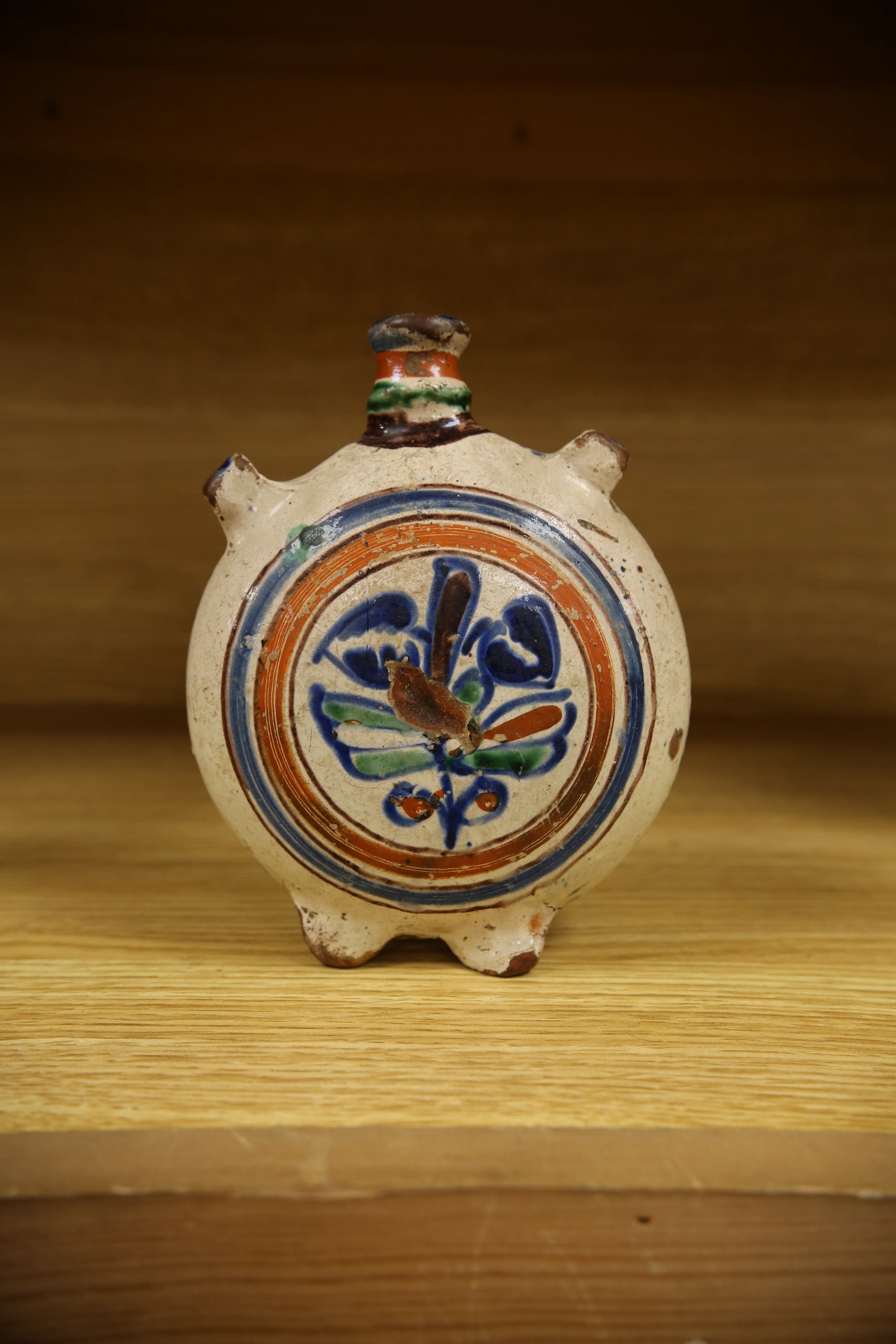 An 18th century? Spanish maiolica pilgrim flask, 17cm. Condition - poor to fair